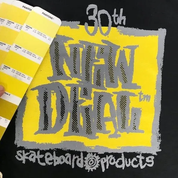 custom screen printing on black shirt with new deal logo